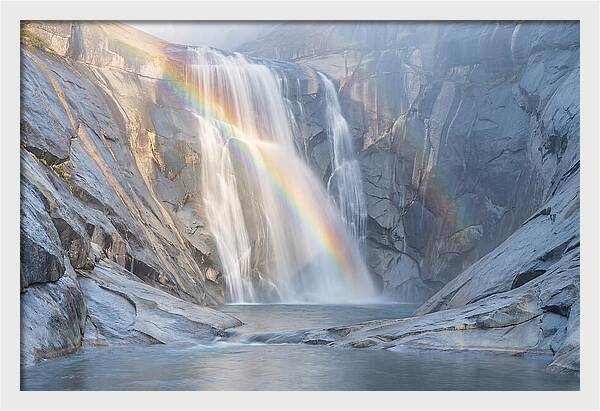 Cliff Face Waterfall With Rainbow