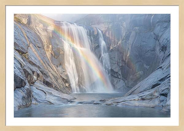 Cliff Face Waterfall With Rainbow
