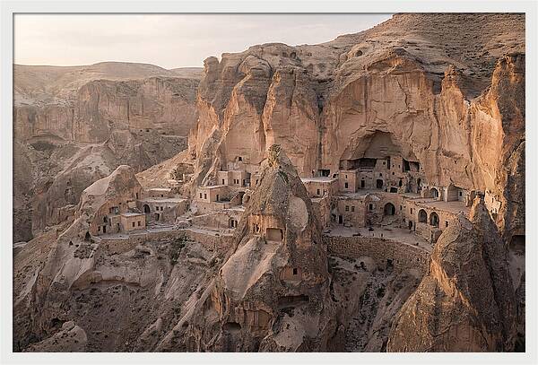 Cliffside Dwellings At Dusk