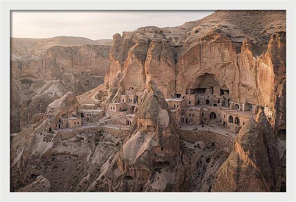 Cliffside Dwellings At Dusk