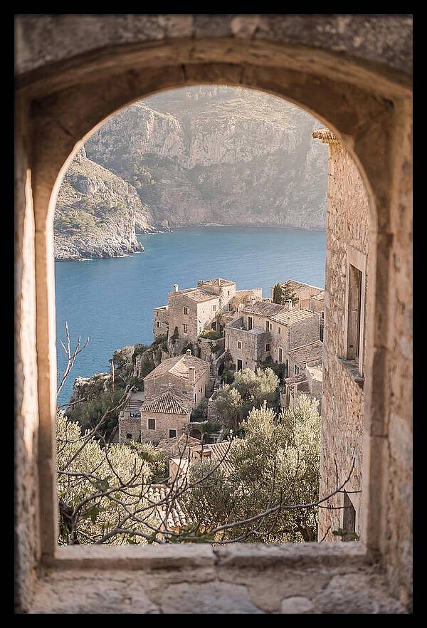 Cliffside Village Overlooking Deep Blue