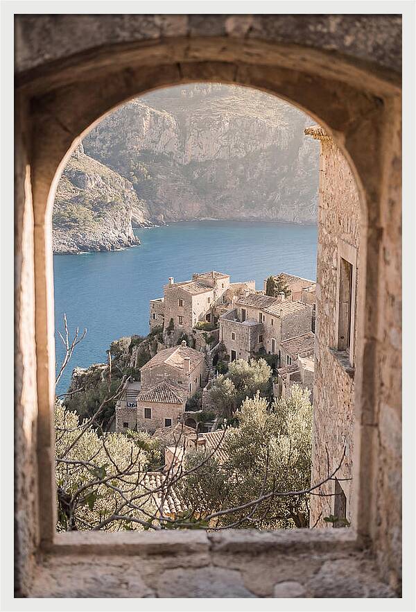 Cliffside Village Overlooking Deep Blue