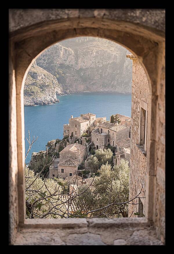 Cliffside Village Overlooking Deep Blue