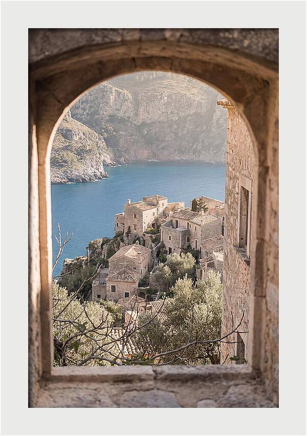 Cliffside Village Overlooking Deep Blue