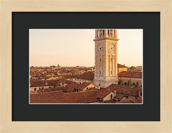 Clock Tower Above Red Tile Rooftops