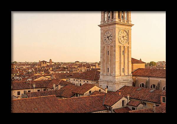 Clock Tower Above Red Tile Rooftops