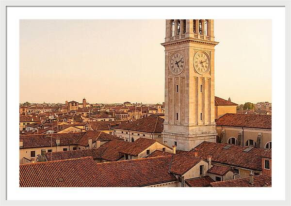 Clock Tower Above Red Tile Rooftops