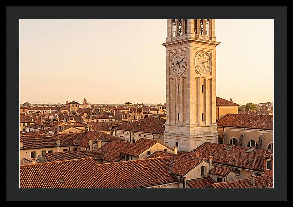 Clock Tower Above Red Tile Rooftops