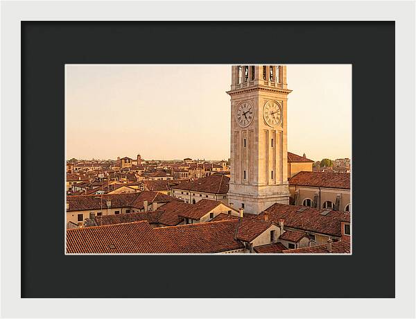 Clock Tower Above Red Tile Rooftops