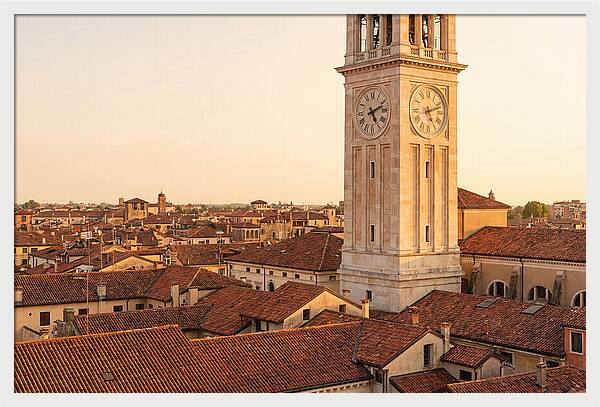 Clock Tower Above Red Tile Rooftops