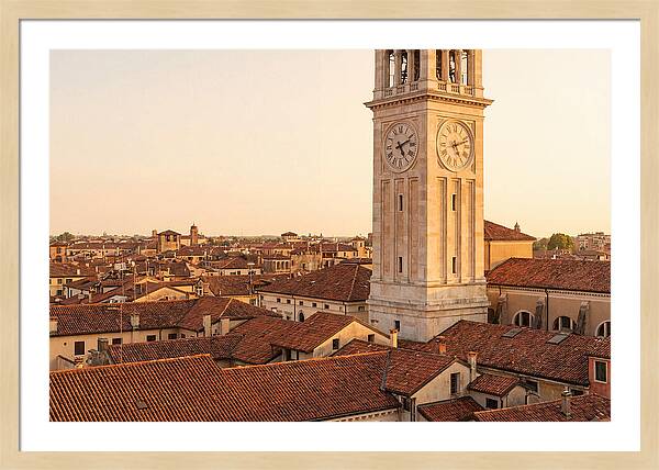 Clock Tower Above Red Tile Rooftops