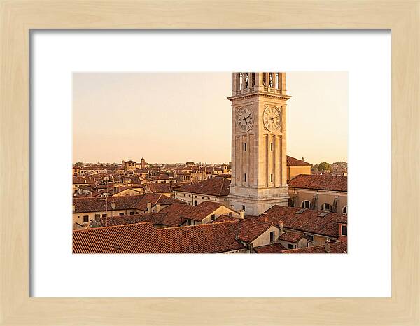 Clock Tower Above Red Tile Rooftops
