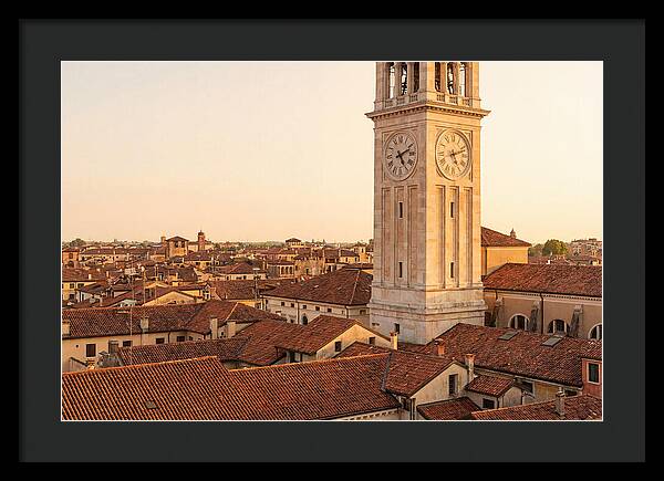 Clock Tower Above Red Tile Rooftops
