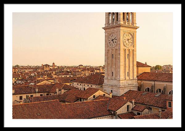 Clock Tower Above Red Tile Rooftops