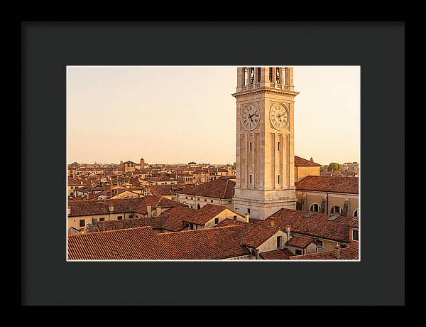 Clock Tower Above Red Tile Rooftops