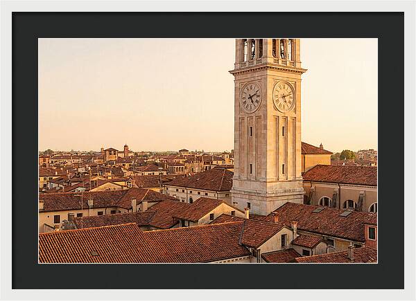 Clock Tower Above Red Tile Rooftops
