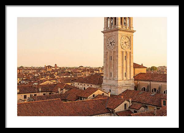Clock Tower Above Red Tile Rooftops