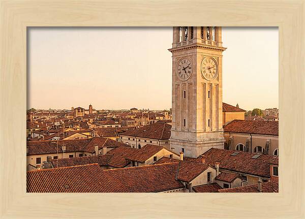 Clock Tower Above Red Tile Rooftops