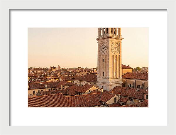 Clock Tower Above Red Tile Rooftops