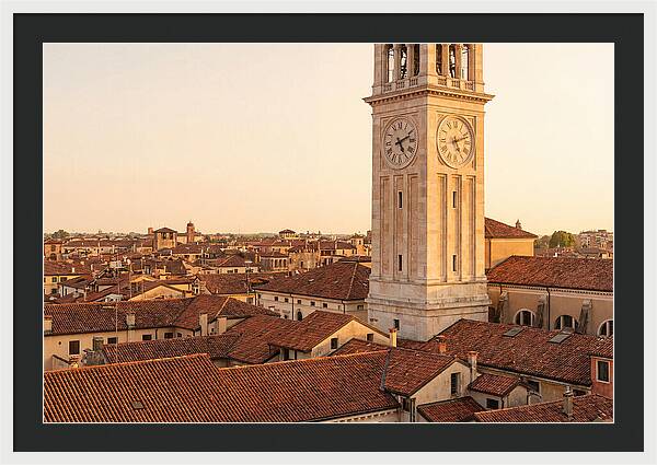 Clock Tower Above Red Tile Rooftops