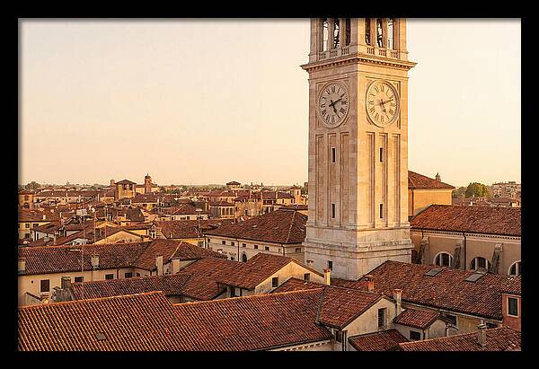 Clock Tower Above Red Tile Rooftops