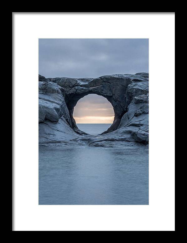 Coastal Rock Arch Framing Sunset
