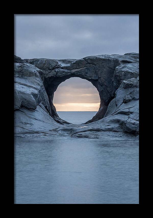 Coastal Rock Arch Framing Sunset