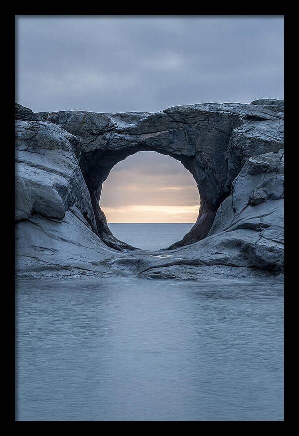 Coastal Rock Arch Framing Sunset