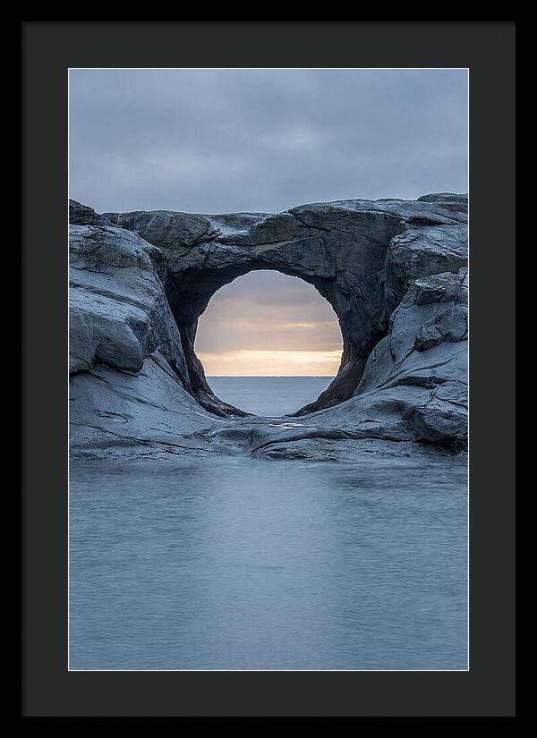 Coastal Rock Arch Framing Sunset