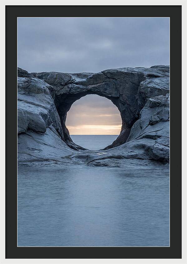Coastal Rock Arch Framing Sunset
