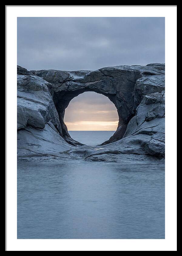 Coastal Rock Arch Framing Sunset