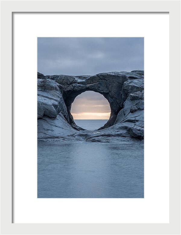 Coastal Rock Arch Framing Sunset