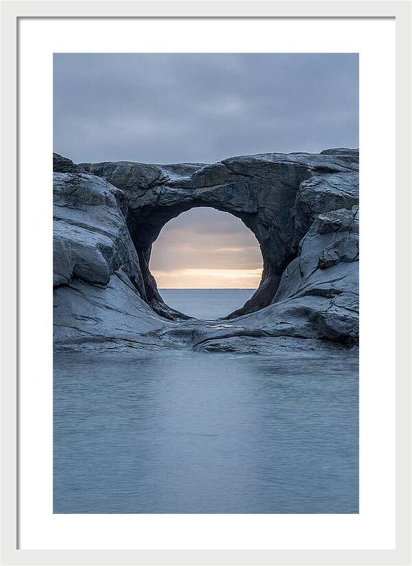 Coastal Rock Arch Framing Sunset