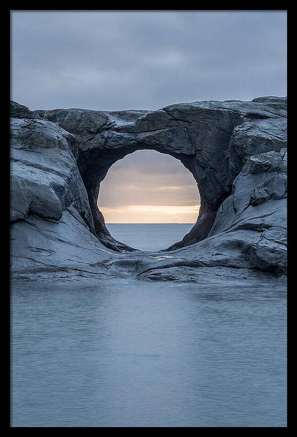 Coastal Rock Arch Framing Sunset