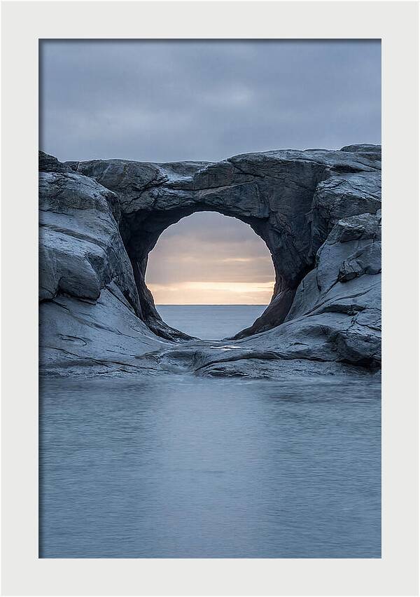 Coastal Rock Arch Framing Sunset