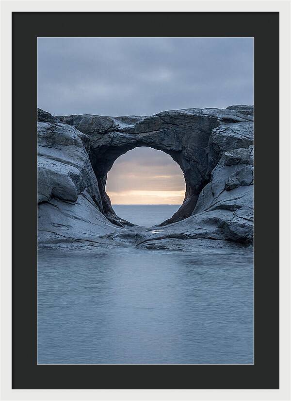 Coastal Rock Arch Framing Sunset
