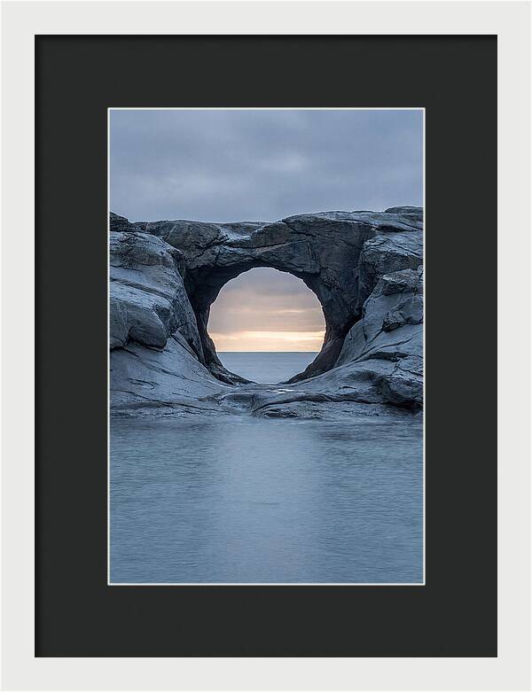 Coastal Rock Arch Framing Sunset