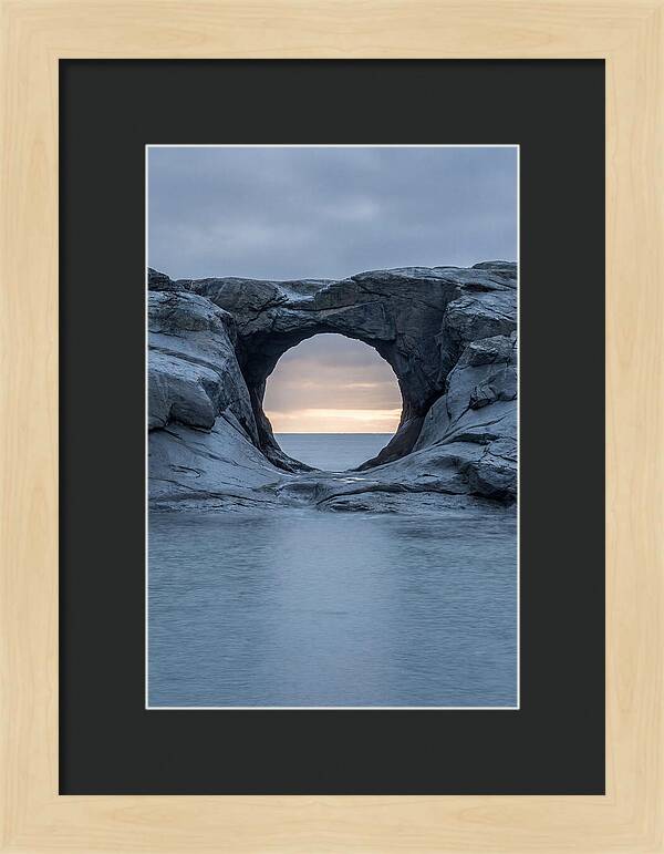 Coastal Rock Arch Framing Sunset