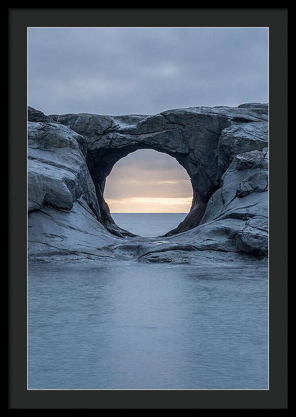 Coastal Rock Arch Framing Sunset