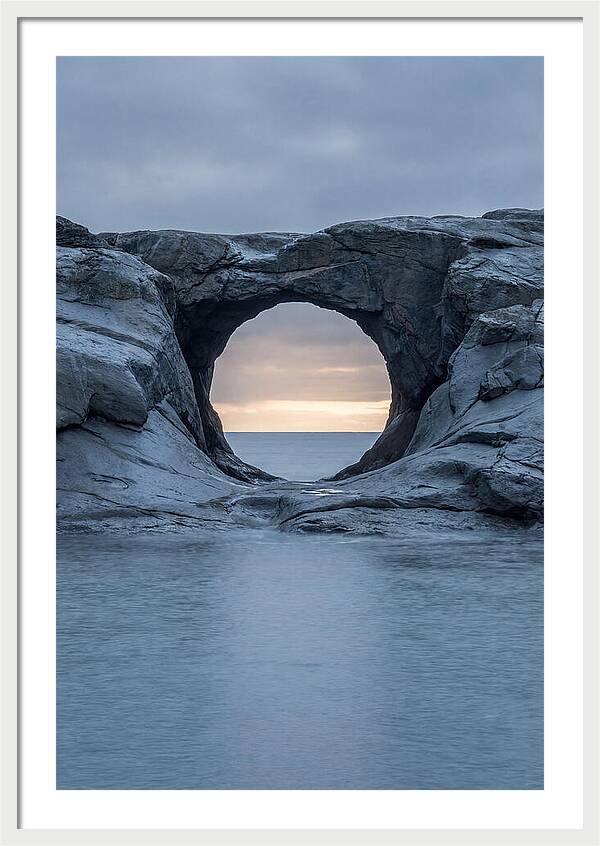 Coastal Rock Arch Framing Sunset