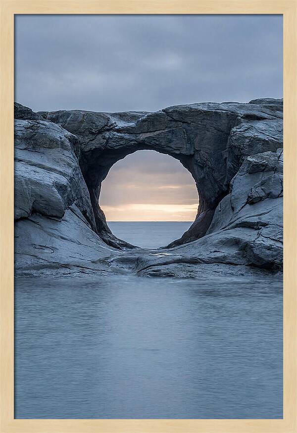 Coastal Rock Arch Framing Sunset