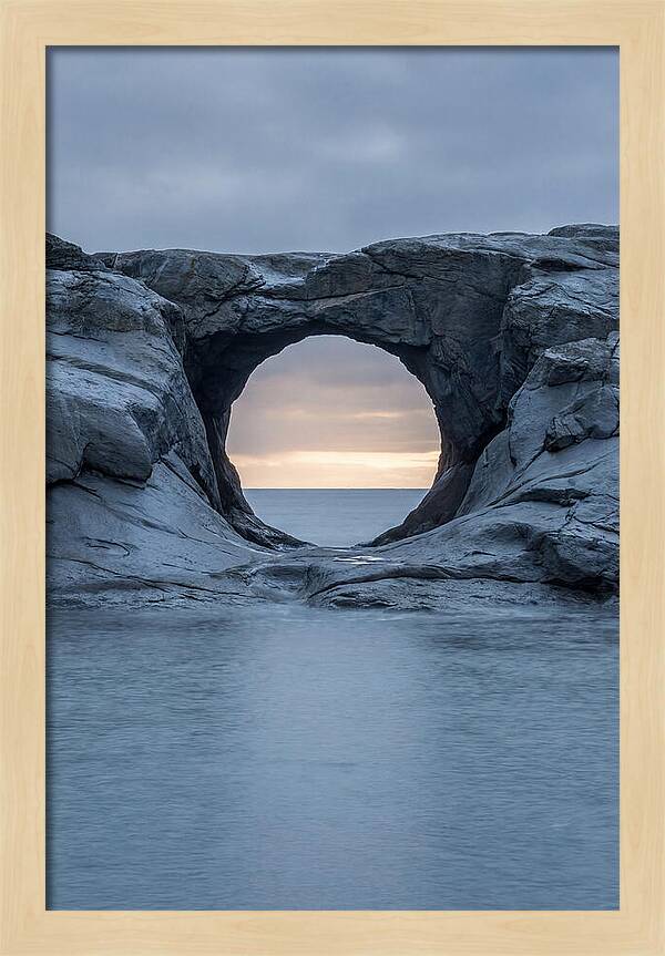 Coastal Rock Arch Framing Sunset