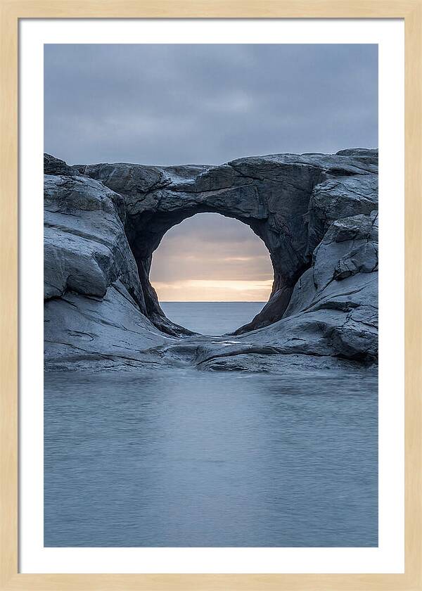 Coastal Rock Arch Framing Sunset