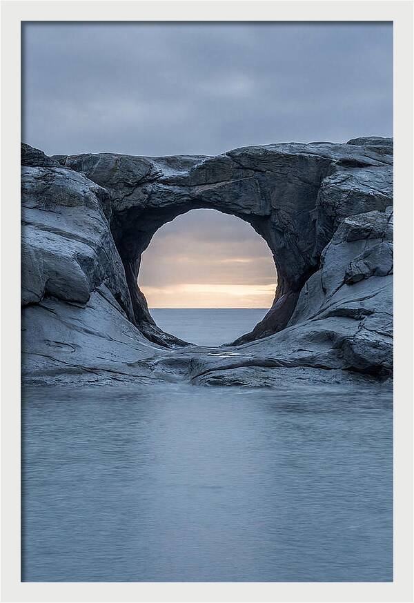 Coastal Rock Arch Framing Sunset