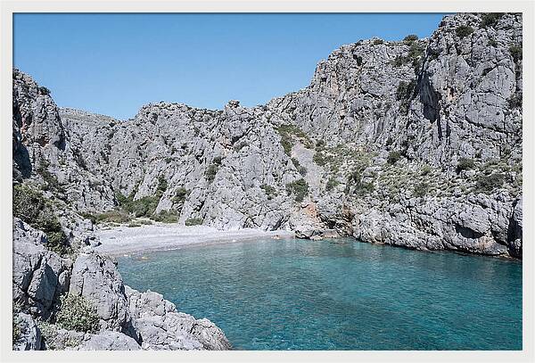 Cove Nestled Between Tall Cliffs