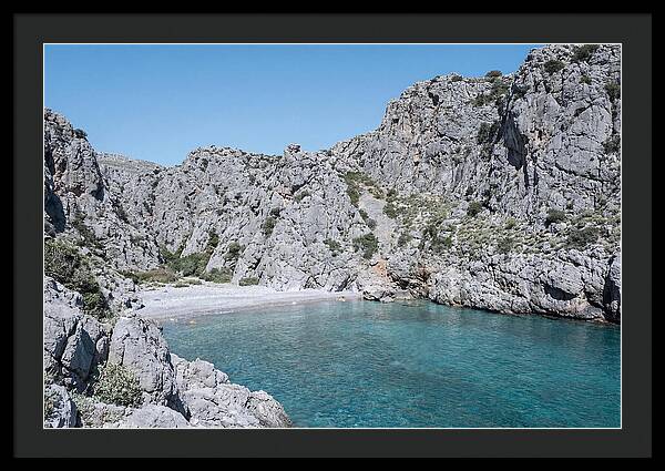Cove Nestled Between Tall Cliffs