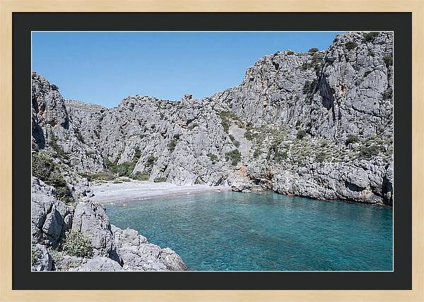 Cove Nestled Between Tall Cliffs