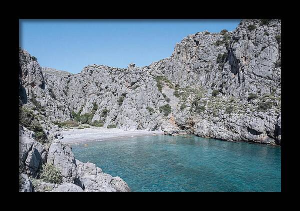 Cove Nestled Between Tall Cliffs