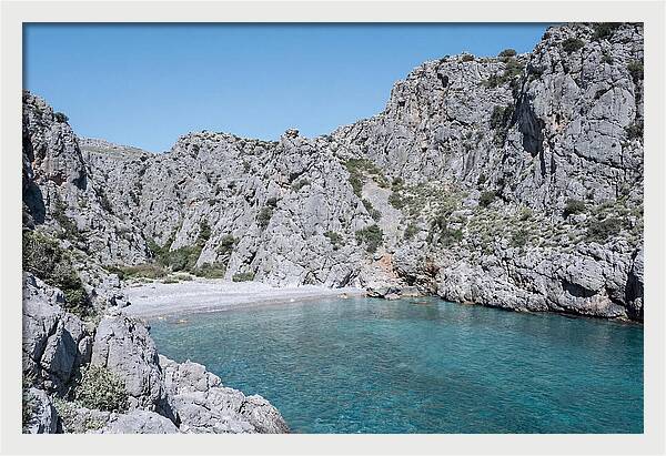 Cove Nestled Between Tall Cliffs