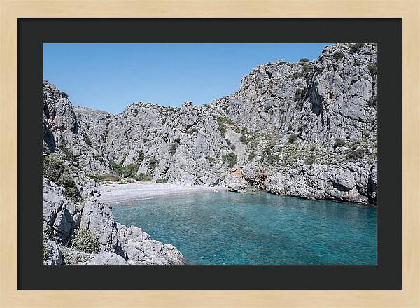 Cove Nestled Between Tall Cliffs